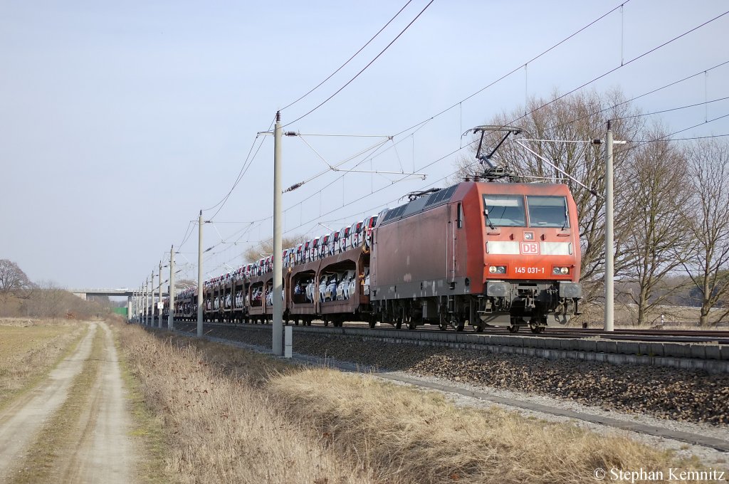 145 031-1 mit dem Fiat-Autozug zwischen Gro�wudicke und Rathenow in Richtung Stendal unterwegs. 21.03.2011