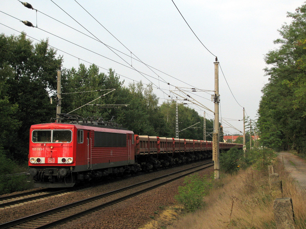 155 063-1 mit einem von 5000 Schotterz�gen zum/vom BBI Richtung Falkenberg am 21.09.2009.