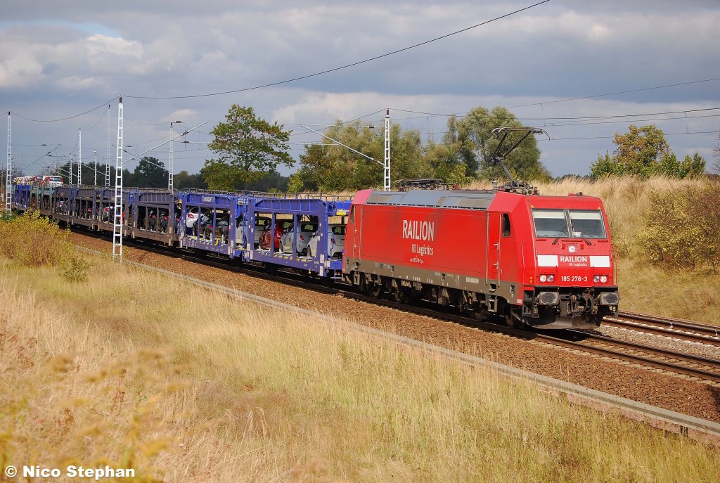185 276-3 hatte einen vollen Mosolf-Autozug am Haken,als sie am B� 72 bei Priort abgelichtet wurde (25.09.09)