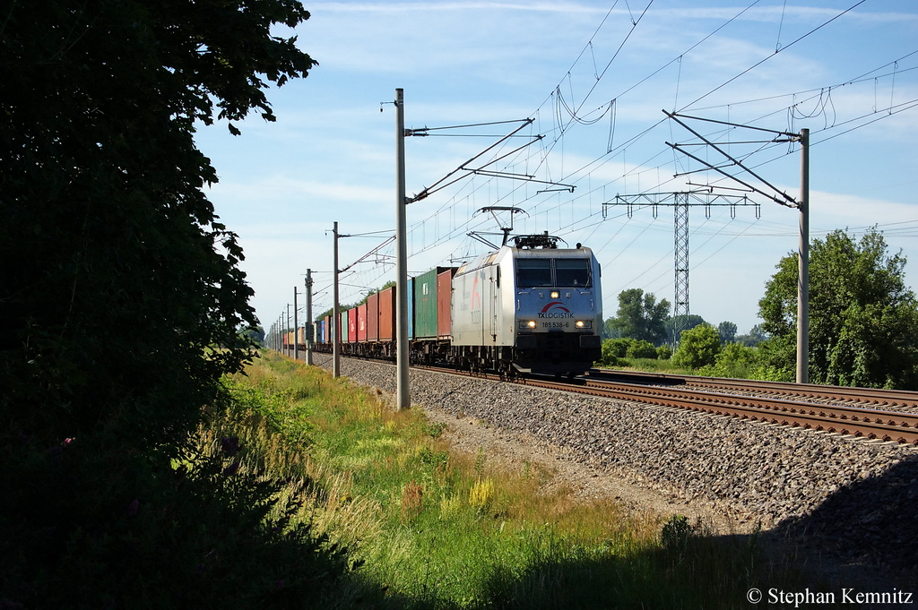 185 538-6 TX Logistik AG im Dienst f�r die OHE mit Containerzug in Vietznitz Richtung Paulinenaue unterwegs. Netten Gru� zur�ck! 29.06.2011