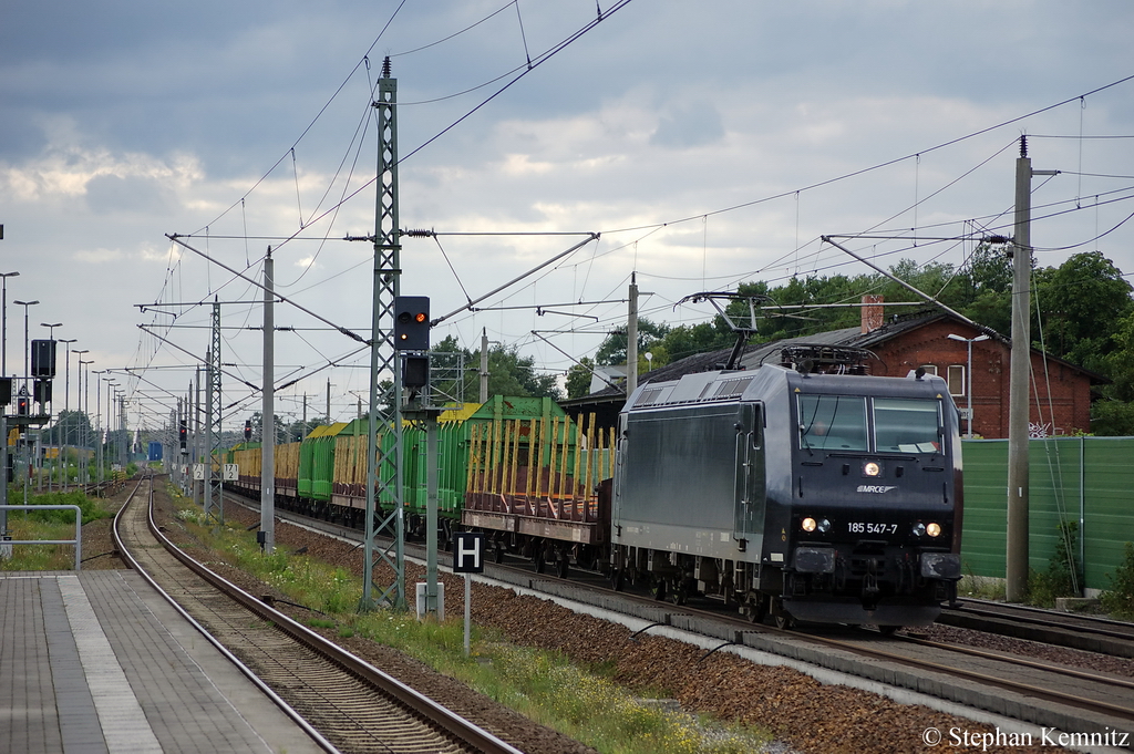185 547-7 MRCE im Dienst f�r die PRESS mit leeren Holzzug in Rathenow Richtung Wustermark unterwegs. 14.07.2011