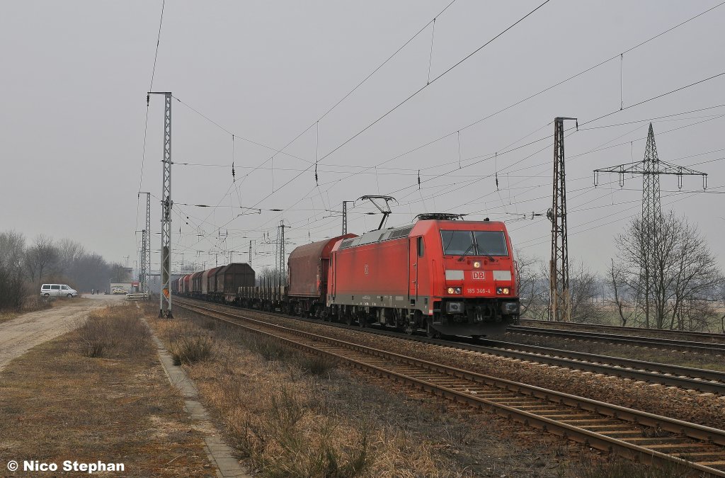 Ein f�r Ziltendorf bestimmter G�terzug,war am Haken der 185 346-4 dran,als sie durch Saarmund rollte (15.03.11)