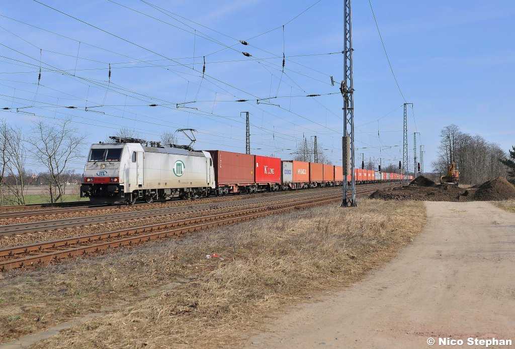 Zur Nordsee war 186 140-0 der ITL mit ihrem Containerzug unterwegs,Saarmund (23.03.11)
