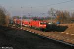 Der  Heuler  von Hennigsdorf nach Potsdam,war an diesem Tag mit 112 117-7  on Tour ,hier brettert sie �ber den B� 72 bei Priort (02.03.11)