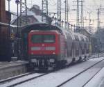 Im winterlichen Spreewald f�hrt los der RE2 (RE 38136)von Cottbus nach Rathenow.