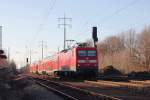 112 188 mit dem RE 3 (RE 18311) nach  Elsterwerda  mit nächstem Halt in Blankenfelde (Teltow-Fläming) am 11. Januar 2014 auf dem südlichen Berliner Außenring bei Diedersdorf.