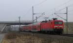 114 027-6 f�hrt hier mit RE5 von Falkenberg nach Stralsund durch das �rtchen Trebbin.