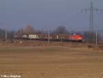 Das Urgestein 140 036-5 mit ihren alten Lampen,brachte einen kurzen Gro�raumwagenzug gen Osten,Nudow (03.03.11)