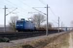 145 030-7 PRESS (145 085-7) mit leeren Holzzug zwischen Gro�wudicke und Rathenow in Richtung Rathenow unterwegs.