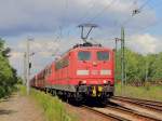 151 104-7 und 151 056-9 mit einem langem Ganzzug Sch�ttgutwagen  nach dem Durchfahren des Bahnhofs K�nigs Wusterhausen  in Richtung  Cottbus am 22. Juli 2012.