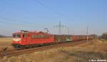 155 219-9 in orientrot hatte einen vollen Blechrollenzug von Ziltendorf nach Seddin zu bringen und passiert die Fotoh�gel von Nudow (03.03.11)