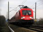 182 008-3 mit einem RE nach Leipzig Hbf am 13.12.2009 aufgenommen in der Einfahrt des Bahnhofs Calau&acute;s.