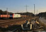 ITL 185 649-1 mit einem halb ausgelasteten Containerzug f�r den Hamburger Hafen im sch�nen Abendlicht in Satzkorn (21.02.11)