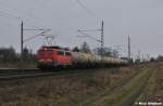 Der  Flickenteppich  140 459-9 hatte einen Ganzzg aus polnischen Kesselwagen durch's tr�be Wetter zu ziehen,B� 72 bei Priort (18.03.11)
